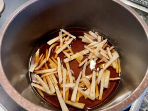 Gingers in a pot with seasonings